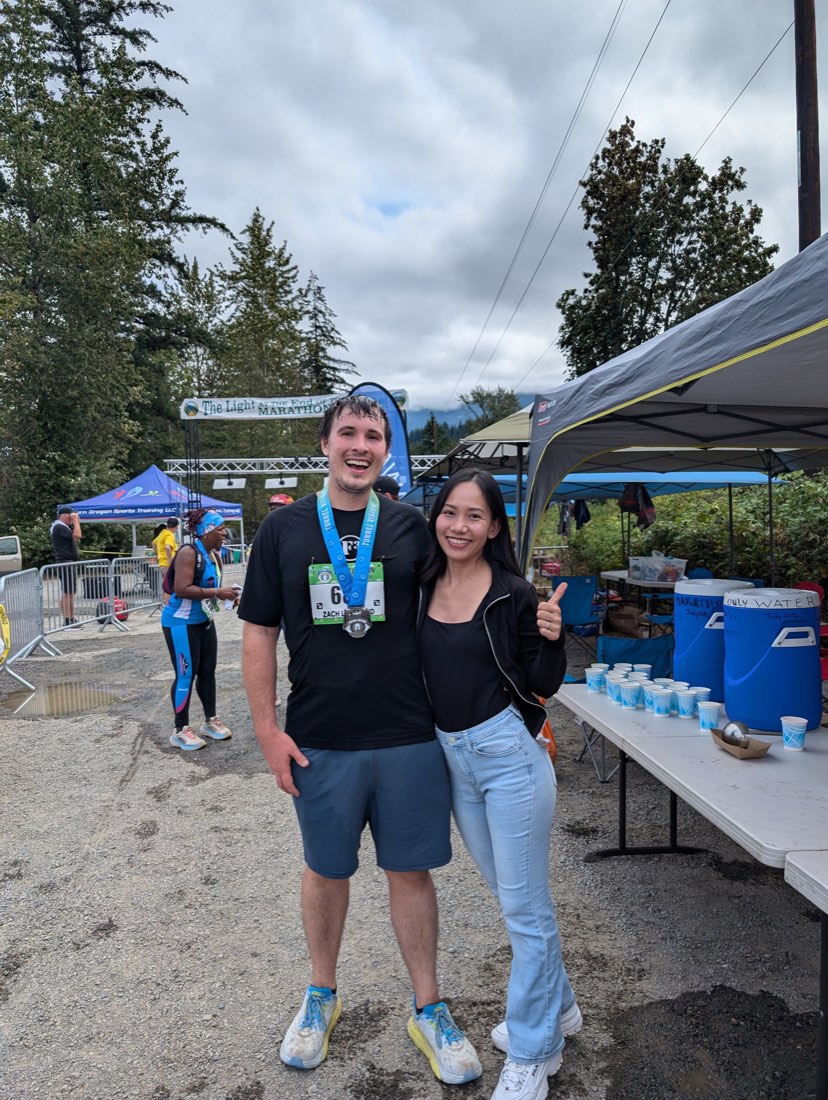 Zach's first (and probably last) marathon. He inexplicably cried at the finish line. She was there anyway.